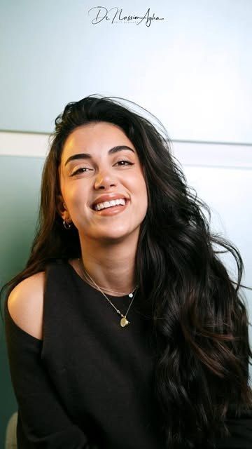 A patient of the clinic smiling